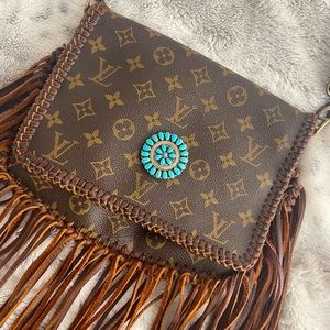 Vintage Authentic Fringe Louis Vuitton purse